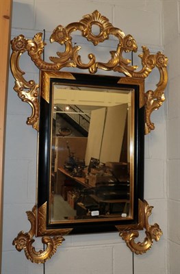 Lot 1213 - A decorative modern mirror