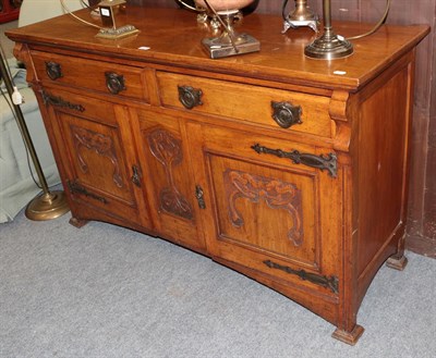 Lot 1216 - An Arts & Crafts oak sideboard (a.f.)