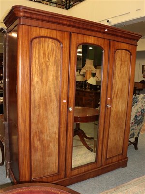 Lot 1223 - A Victorian mahogany mirrored triple wardrobe