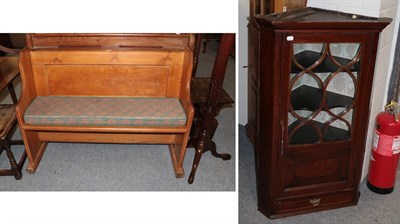 Lot 1239 - A pine church pew with seat cushion and a William lV mahogany and line-decorated hanging corner...