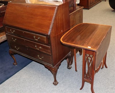Lot 1252 - An early 20th century carved mahogany bureau and an Edwardian satinwood banded Sutherland table