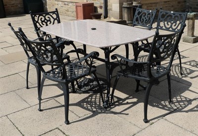 Lot 1280 - A NOVA garden furniture set comprising six cast metal lattice-seated open armchairs and a faux...