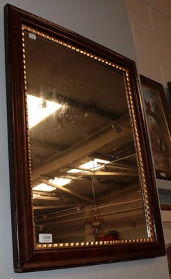 Lot 1304 - A wall mirror with grain painted frame