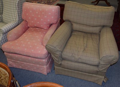 Lot 1321 - A feather filled plaid upholstered armchair, together with a pink upholstered armchair (2)