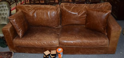 Lot 1332 - A Ralph Lauren brown leather four seater sofa