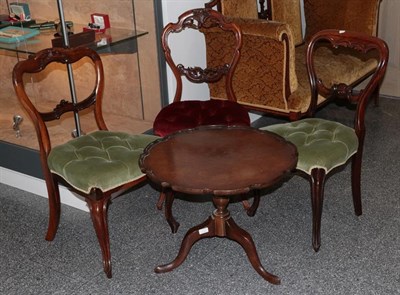 Lot 1337 - A Victorian walnut flip-top piecrust table and three 19th century balloon back chairs (4)