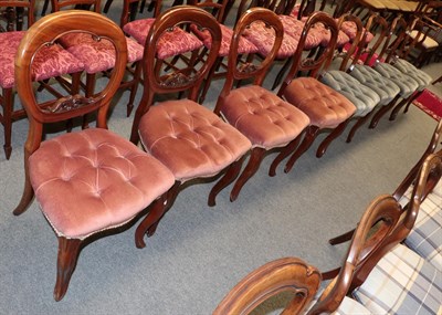 Lot 1339 - A set of four Victorian mahogany balloon back dining chairs with button seats, together with...