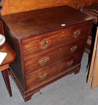 Lot 1352 - A George III mahogany three-height straight front chest of drawers