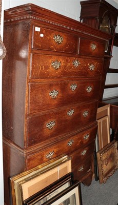 Lot 1354 - A George III oak chest on chest