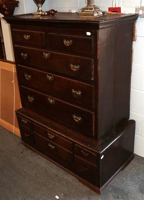 Lot 1361 - A Georgian oak chest on stand comprised of period elements