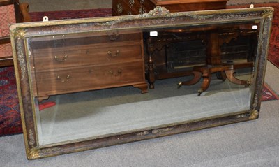 Lot 1363 - A distressed wall mirror with bevelled plate