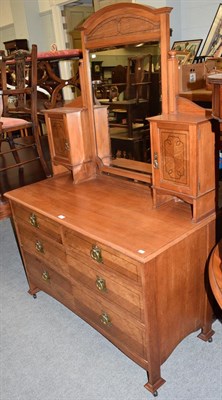 Lot 1377 - An Arts & Crafts walnut and ebony strung dressing chest