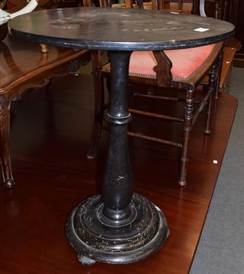 Lot 1379 - A Victorian ebonised mother-of-pearl inlaid circular pedestal table