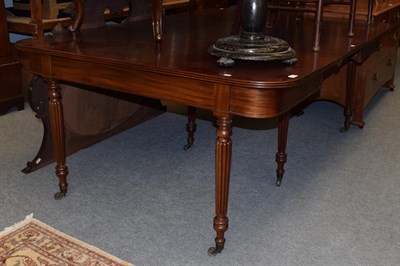 Lot 1380 - An early 19th century mahogany dining table in the manner of Gillows