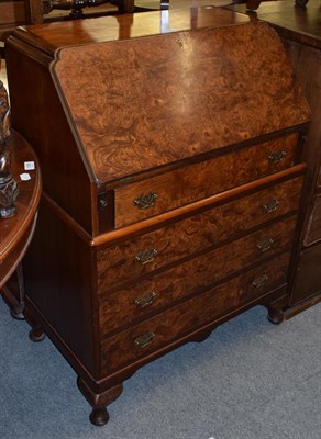 Lot 1384 - A 1930s burr walnut bureau