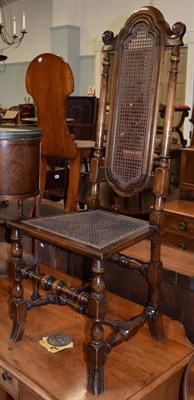 Lot 1387 - A 17th century style stained beech and cane seated hall chair