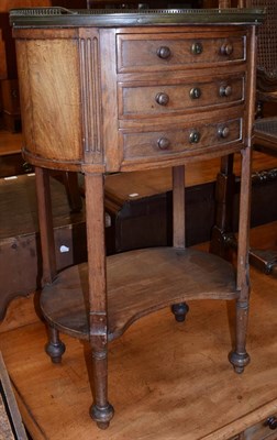 Lot 1388 - A French marble topped oval bedside chest of drawers with brass gallery