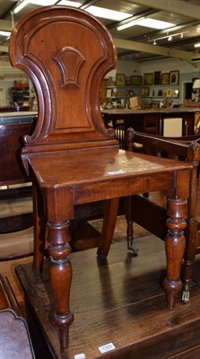 Lot 1389 - A Victorian carved mahogany hall chair