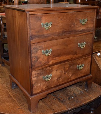 Lot 1393 - A small Georgian style mahogany three-drawer chest