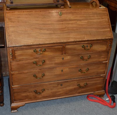 Lot 1399 - A George III mahogany bureau (faded)