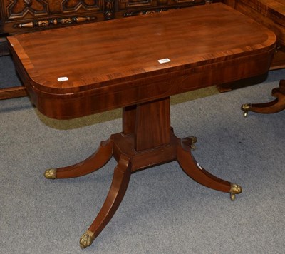 Lot 1406 - A Regency mahogany fold over games table