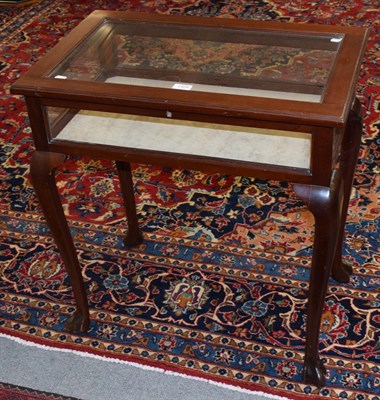 Lot 1408 - A glazed mahogany bijouterie table