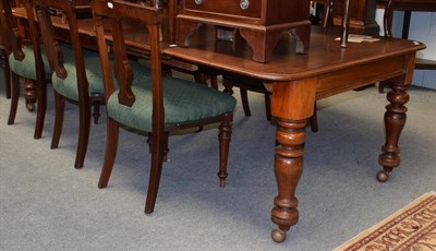 Lot 1443 - A Victorian mahogany extending dining table; and a set of six Victorian mahogany dining chairs