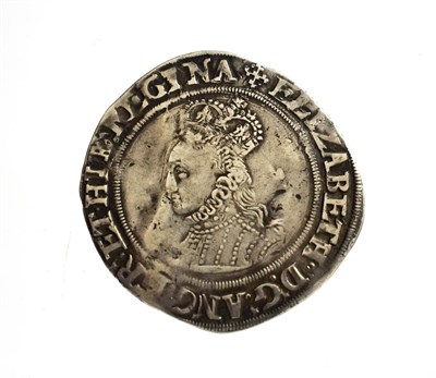 Lot 2033 - Elizabeth I Shilling, second issue (1560-61) without rose or date, mm. cross crosslet, obv....