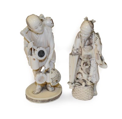 Lot 958 - A Japanese ivory Okimono of a drum seller, Meiji period (1868-1912) signed (a.f.), 12cm high;...