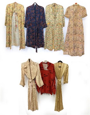 Lot 2007 - Early 20th Century Chinese Brocade Dressing Robes and Others, including two similar robes on a gold