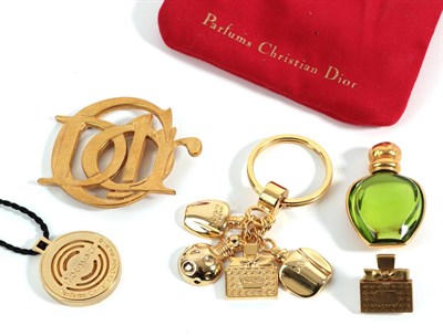 Lot 2087 - A Quantity of Christian Dior Costume Jewellery, comprising of a gilt metal Dior brooch; a Miss Dior