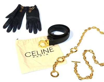 Lot 2100 - Celine Paris Gilt Metal Chain Link Belt and a Celine Black Leather Belt with similar gilt metal...