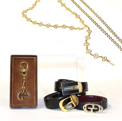 Lot 2101 - Gucci Gilt Metal Logo Keyring in original card box; Gucci Logo Buckle with navy leather belt; Black