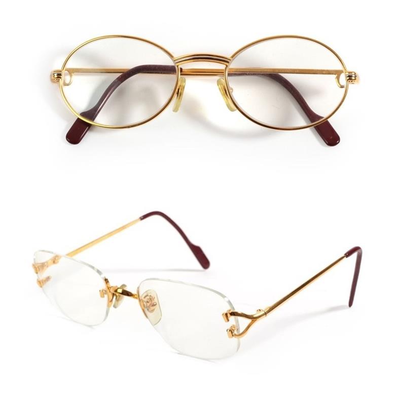 Lot 2119 - Pair of Lady's Cartier Prescription Glasses, with oval gilt metal frames, marked to the reverse...