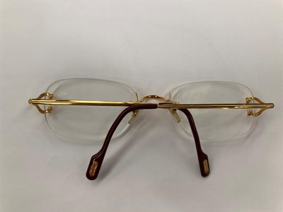 Lot 2119 - Pair of Lady's Cartier Prescription Glasses, with oval gilt metal frames, marked to the reverse...