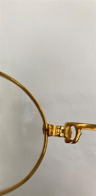 Lot 2119 - Pair of Lady's Cartier Prescription Glasses, with oval gilt metal frames, marked to the reverse...