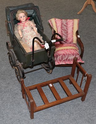 Lot 2149 - Childs mahogany commode chair, oak dolls bed and a childs carriage built pram, Armand Marseille 390