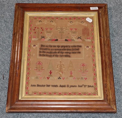 Lot 2156 - Framed sampler worked by Ann Broster, aged 11 year, January 17th 1844, decorated with central...