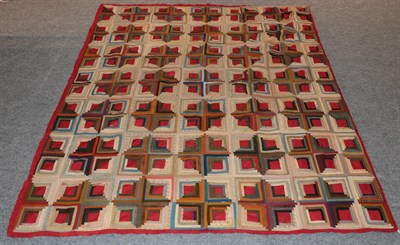 Lot 2158 - 19th century log cabin pattern patchwork quilt, incorporating wools and cotton flannels with a...