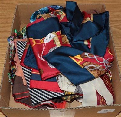 Lot 2167 - Assorted silk and polyester scarves including a Hermes silk scarf in red and blue silk...