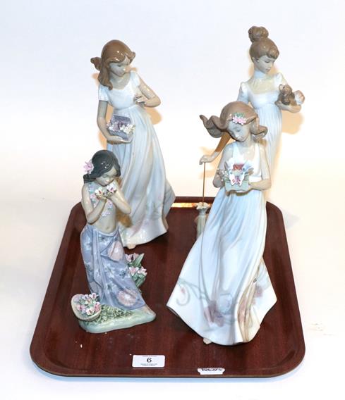 Lot 6 - Four Lladro figures ''Butterfly treasures'', Travelling companions'', ''Aroma of the islands''...