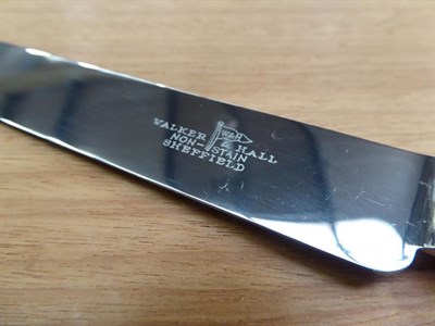 Lot 18 - A Walker & Hall oak case EPNS canteen of cutlery