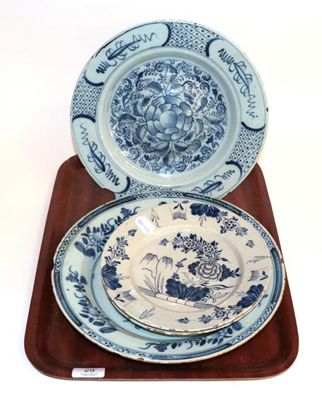 Lot 29 - Two 19th century blue and white English Delft plates, together with a smaller pair of English Delft