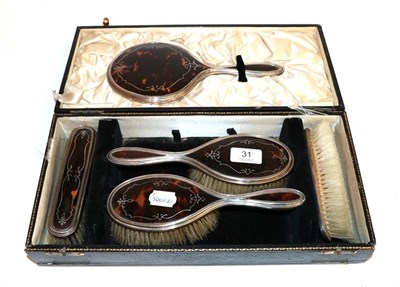 Lot 31 - A silver and tortoiseshell cased dressing table set