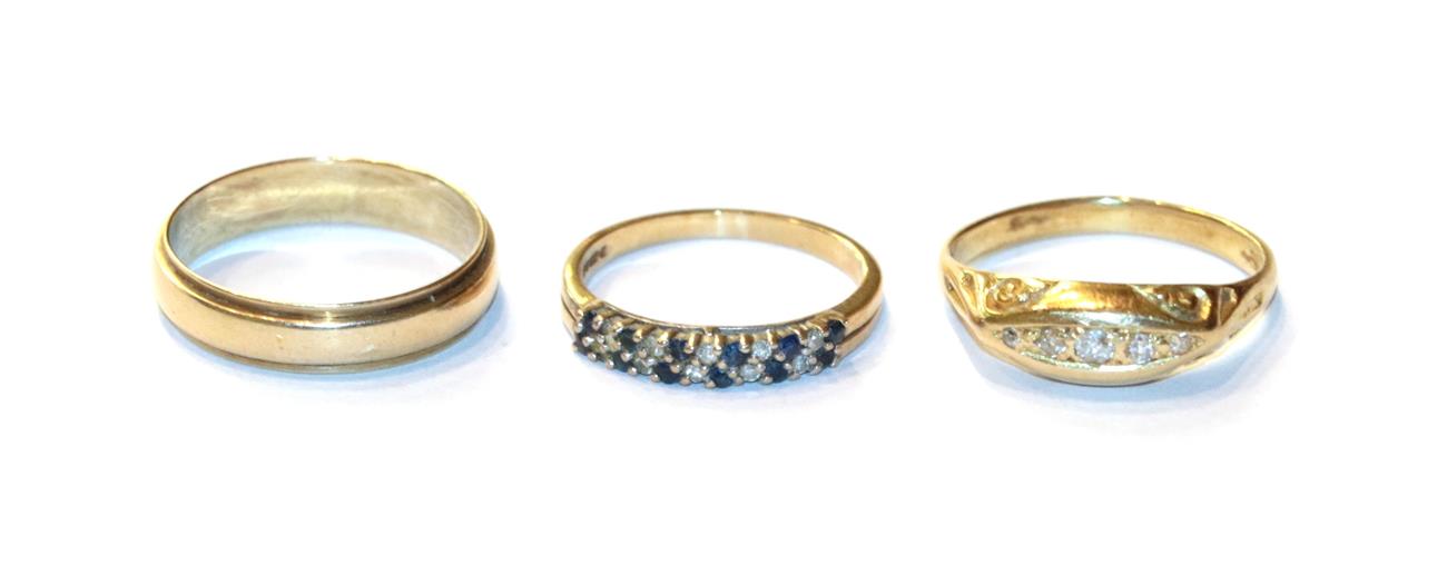 Lot 40 - A 9 carat gold sapphire and diamond two row ring, finger size K1/2; a diamond five stone ring,...