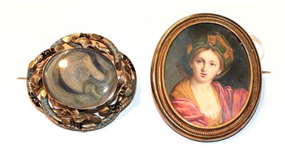 Lot 43 - A Victorian hair work mourning brooch, measures 5.5cm by 5.0cm; and a late 19th century...