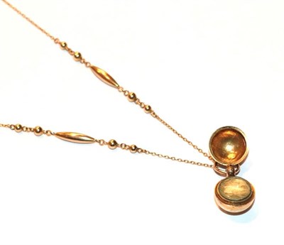 Lot 45 - A Victorian ball hair locket on a fancy link chain, length 39cm