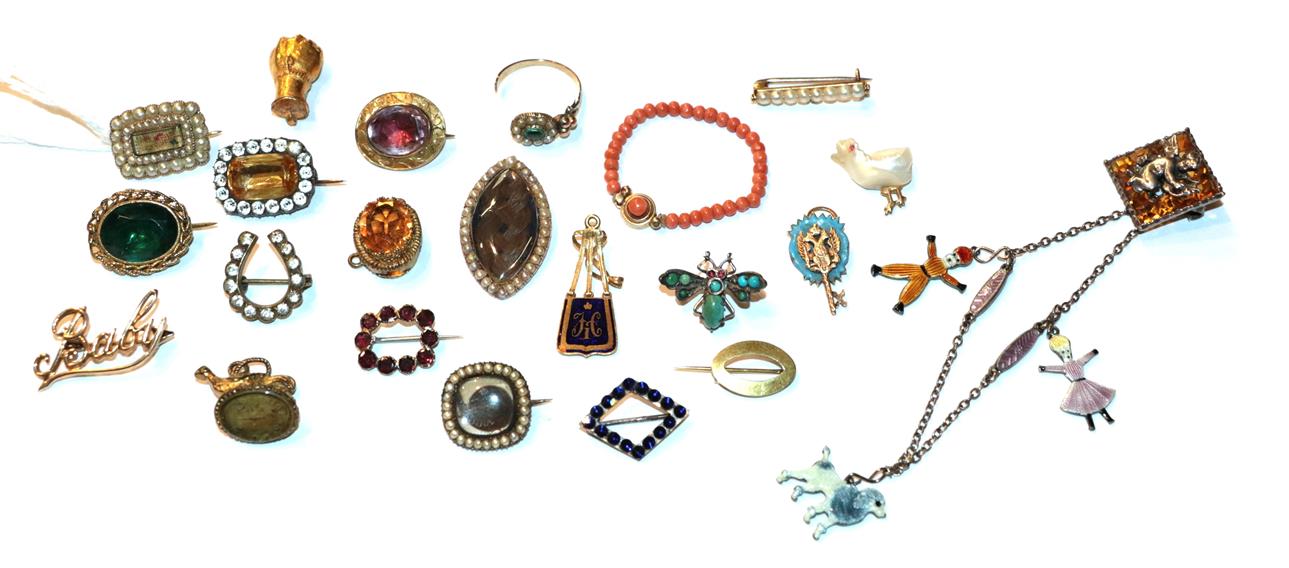Lot 48 - A collection of seed pearl memorial brooches, an enamel bracelet, a coral baby's bracelet, a...