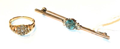 Lot 54 - A diamond cluster ring, unmarked, finger size H; and a blue zircon and seed pearl bar brooch,...