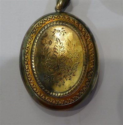 Lot 55 - Four Victorian lockets including an oval locket with a star motif formed of an emerald and...